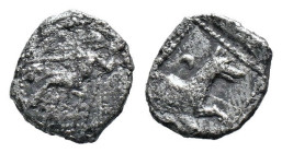 (Silver, 0.54g 11mm)Lykaonia, Laranda. Ca. 324-323 B.C. AR obol . Baaltars seated left, holding grain ear, bunch of grapes, and scepter / Forepart of ...