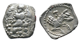 (Silver, 0.57g 11mm)Lykaonia, Laranda. Ca. 324-323 B.C. AR obol . Baaltars seated left, holding grain ear, bunch of grapes, and scepter / Forepart of ...