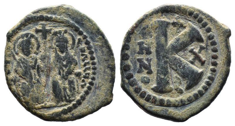 (Bronze, 5.99g 23mm) BYZANTINE EMPIRE. Justin II, with Sophia. 565-578. Æ follis...