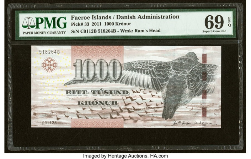 Faeroe Islands Foroyar 1000 Kronur 2011 Pick 33 PMG Superb Gem Unc 69 EPQ. 

HID...