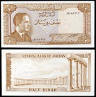 s/d. Jordania. Banco Central. 1/2 dinar. (Pick 13c). Hussein / Ruinas de Jerash. S/C.