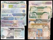 Libia. 14 billetes de distintos valores y fechas. S/C-/S/C.