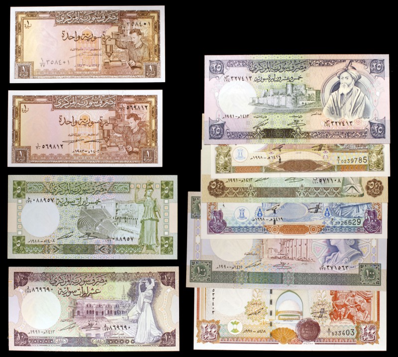 Siria. 10 billetes de distintos valores y fechas. S/C-/S/C.