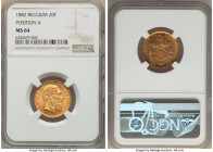 Leopold II gold 20 Francs 1882 MS64 NGC, Brussels mint, KM37. Position A. An exceptionally detailed example with wonderful luster and original color. ...