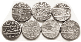 INDIA, 7 diff Mughal Rupees of Muhammad Shah, 1719-48, all VF or so with an occasional punchmnk.