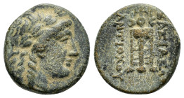SYRIA.Seleukis and Pieria.Antiochos II.(261–246 BC).Ae.

Obv : Laureate head of Apollo right.

Rev : BAΣΙΛΕΩΣ ANTIOXOY.
Tripod; anchor below; monogram...