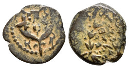 JUDAEA. Hasmoneans. John Hyrkanos II.(67/3-40 BC).Jerusalem.Ae.

Obv : Splayed double cornucopia with pomegranate between the horns.

Rev : Legend in ...