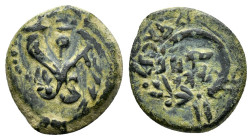 JUDAEA. Hasmoneans. John Hyrkanos I.(135-104 BC).Jerusalem.Ae.

Obv : Splayed double cornucopia with pomegranate between the horns.

Rev : Legend in f...