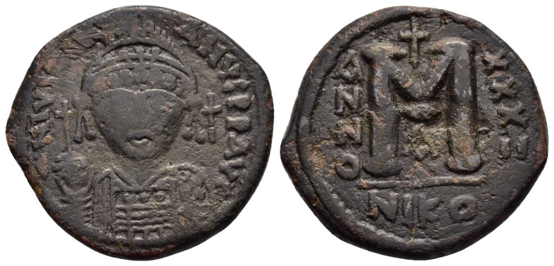 JUSTINIAN I.(527-565).Nicomedia.Follis.

Weight : 16.0 gr
Diameter : 31 mm