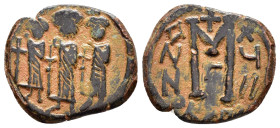ARAB-BYZANTINE. Early Caliphate (636-660). Imitation of a Follis of Heraclius (610-641).

Weight : 3.8 gr
Diameter : 21 mm