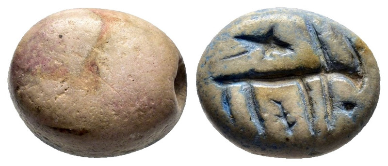 EGYPTIAN SCARAB.(Circa 1650-1550 BC).Faience.

Weight : 1.8 gr
Diameter : 14 mm