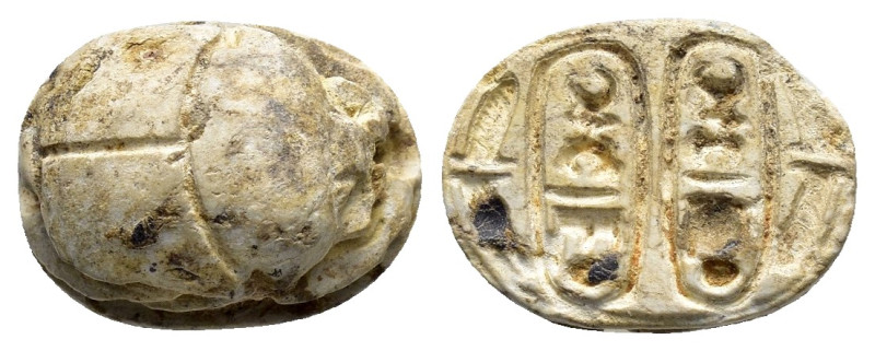 EGYPTIAN SCARAB.(Circa 1650-1550 BC).Faience.

Weight : 1.1 gr
Diameter : 14 mm