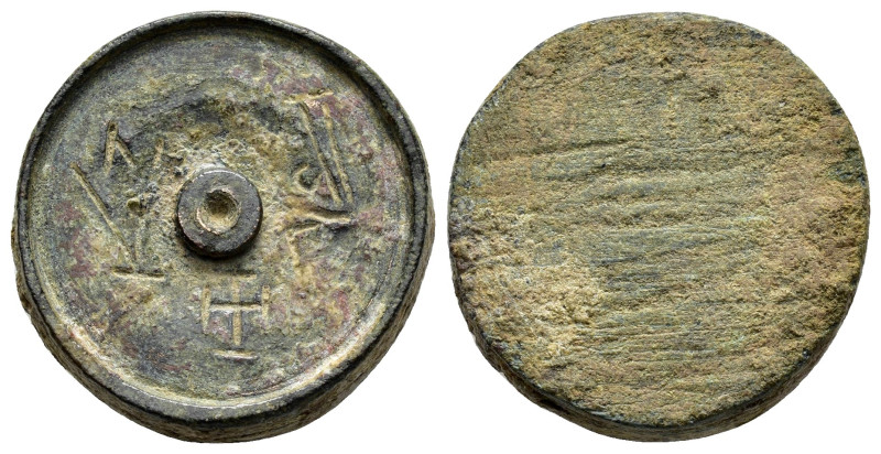 BYZANTINE BRONZE WEIGHT.(Circa 6th - 9th century).Ae.

Weight : 27.5 gr
Diameter...