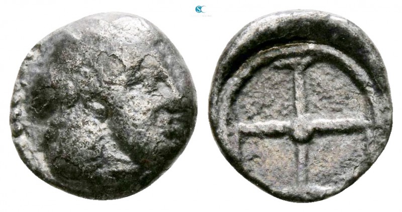 Sicily. Syracuse 475-470 BC. 
Litra AR

 7mm., 0,63g.



nearly very fine