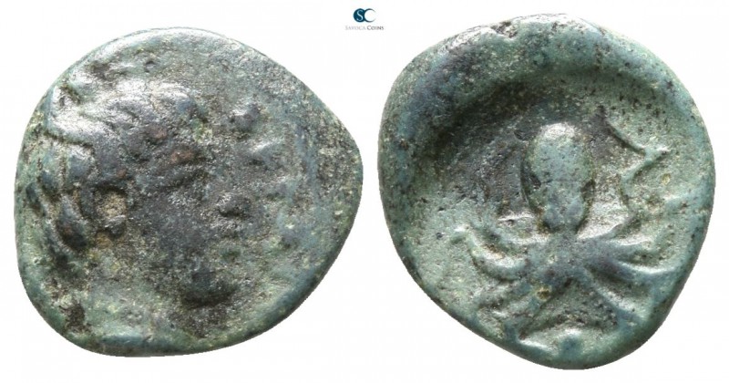 Sicily. Syracuse 466-405 BC. 
Onkia Æ

 11mm., 1,06g.



very fine