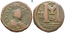 Justin I AD 518-527. Struck AD 518-522. Antioch. Follis Æ