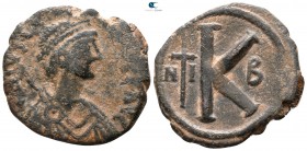 Justinian I AD 527-565. or Justin I (AD 518-527). Nikomedia. Half follis Æ
