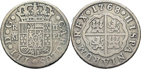 Madrid. 2 reales. 1768 parece estar sobre 7. PJ