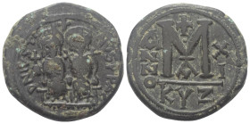 Iustinus II. (565 - 578 n. Chr.).

 Follis (40 Nummi). 575 / 576 n. Chr. (Jahr 11). Kyzikos.
Vs: Iustinus mit Kreuzglobus und Sophia mit Kreuzszept...