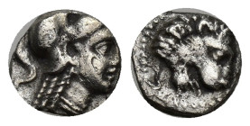 Pamphylia, Side. 3rd-2nd century B.C. AR obol (8mm, 0.59 g). Helmeted head of Athena right. / Head of roaring lion right