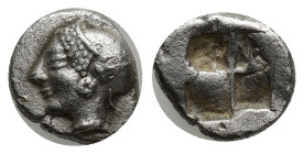 IONIA. Phokaia. (Circa 521-478 BC). AR Diobol. (9mm, 1.34 g) Obv: Archaic female head left, wearing earring and helmet or close fitting cap.. Rev: Qua...