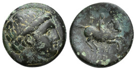 KINGS OF MACEDON. Philipp III Arrhidaios (323-317). Ae. (18mm, 4.96 g) Milet. Obv: Head of Apollo right, wearing tainia. Rev: BAΣIΛEΩΣ ΦΙΛΙΠΠΟΥ. Horse...