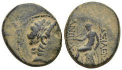 Seleukid Kingdom. Antioch. Antiochos III Megas 223-187 BC. Bronze Æ (23mm, 14.46 g). Laureate head right / BAΣΙΛΕΩΣ ΑΝΤΙΟΧΟΥ, Apollo seated left on om...