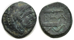 KINGS OF MACEDON. Alexander III 'the Great' (336-323 BC). Ae. (16mm, 5.35 g) Uncertain mint in Macedon. Obv: Head of Herakles right, wearing lion skin...