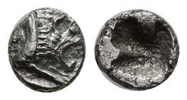 Caria, Mylasa(?). Ca. 520-490 B.C. AR 1/24 stater (6mm, 0.36 g). Forepart of lion right / Incuse square punch.