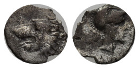 Pamphylia. Side circa 370-360 BC. Obol AR. (10mm, 0.38 g) Lion’s head left with open jaws and tongue protruding Rev. Head of Athena right wearing cres...