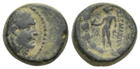 Lydia. Sardeis circa 200-133 BC. Bronze Æ (15mm, 6.37 g). Unbearded, laureate head of Herakles right, lionskin knotted around neck / ΣAΡΔIANΩN, Apollo...