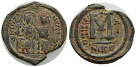 JUSTIN II. (565-578 AD)Nicomedia AE Follis (28mm, 15.21 g) Obv: Facing, crowned busts of Justin and Sophia on double throne, he holds globus cruciger,...