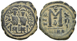 Justin II, with Sophia. 565-578. Æ Follis (30mm, 13.21 g). Nicomedia mint, 1st officina. Dated RY 13 (578/9). Justin and Sophia seated facing, holding...