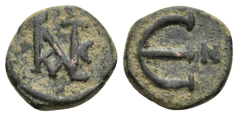 Justin II AD 565-578. Nikomedia Pentanummium Æ (12mm, 1.88 g) Monogram of Justin...