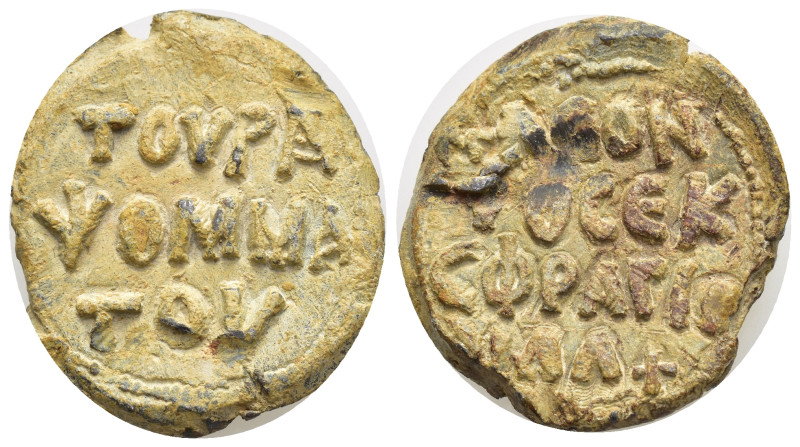 Byzantine lead seal, Legends three lines, Rev: Legends four lines. 26mm. 15,85 g...