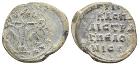 Byzantine Lead Seal Obv: Patriarchal cross set upon three steps; floral scroll to left and right. Rev: Legends in five lines. 20mm, 5.21 gr.