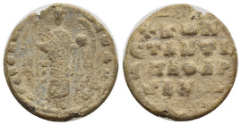 BYZANTINE LEAD SEALS. Obv: St. Michael the Archangel standing facing, holding lis-tipped sceptre and globus. Rev: Legends in four lines. 23mm, 6.88 gr...