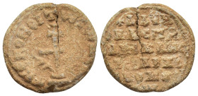 Byzantine Lead Seal Obv: Patriarchal cross set upon three steps; floral scroll to left and right. Rev: Legends in five lines. 21mm, 6.28 gr.