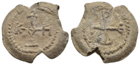 Byzantine monogrammatic lead seal Obv: Cruciform invocative monogram. Wreath border. Rev: Cross monogram. Wreath border. 23mm, 9.61 gr.