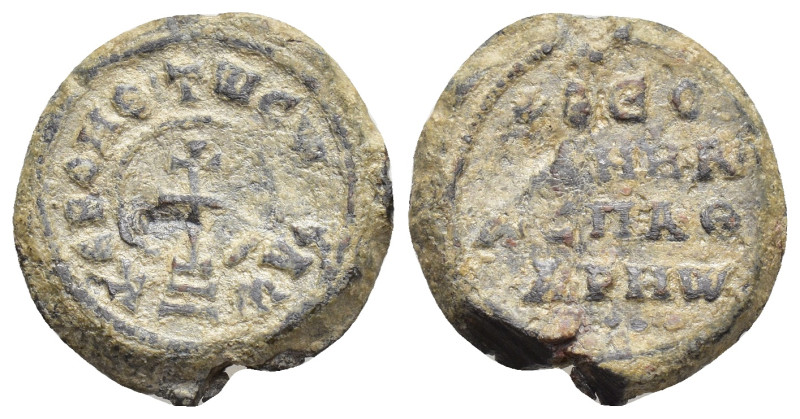 BYZANTINE LEAD SEALS. Obv: + KЄ BOHΘH Tω Cω ΔɄ Λω. Patriarchal cross set upon th...