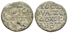 Byzantine Lead Seal Obv: Cruciform monogram Rev: Legends in four lines. 21mm, 7.95 gr.