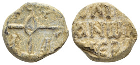 Byzantine Lead Seal Obv: Cruciform monogram Rev: Legends in three lines. 15mm, 7.56 gr.