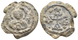 Byzantine Lead Seal Obv: Facing bust of the Virgin Mary, holding Christ medallion on breast. Rev: Cruciform monogram. 23mm, 11.00 gr.