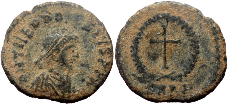 Theodosius II, AE, Nummus. (Bronze, 0.99 g. 14 mm.) Cyzicus. 402-450 AD. Theodos...