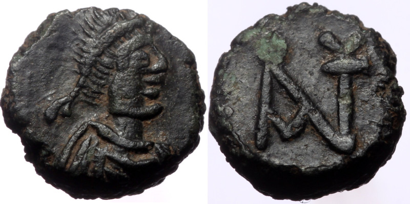 Anastasius I. AE, Nummus. (Bronze, 0.81 g, 7 mm.) Constantinople. 491-518 AD. An...