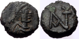 Anastasius I. AE, Nummus. (Bronze, 0.81 g, 7 mm.) Constantinople. 491-518 AD.