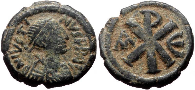 Justin I, AE, Pentanummium. (Bronze, 2.15 g. 14 mm.) Constantinople. 512-518 AD ...