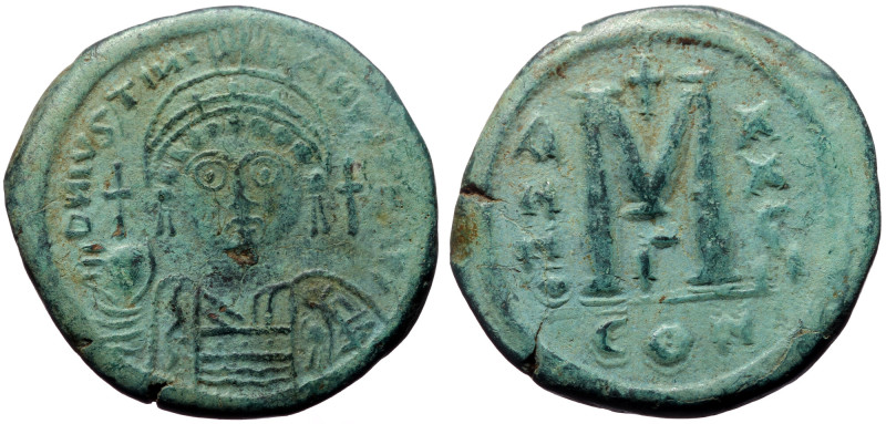 Justinian I. AE, Follis. (Bronze 14.97 g, 31 mm.) Constantinople. 527-565 AD. Ju...