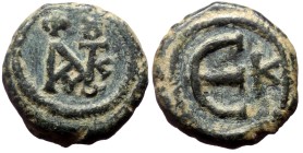 Justin II, AE, Pentanummium, (Bronze, 2.58 g. 13 mm.) Constantinople (?). 565-578 AD.