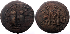 Phocas and Leontia, AE, Follis (Bronze, 10.41 g. 27 mm.) Uncertain mint. 602-610 AD. Overstruck.